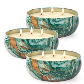 3 tin cans with lemongrass candles