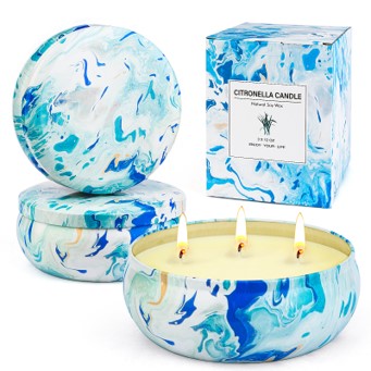 3 tin cans with lemongrass candles